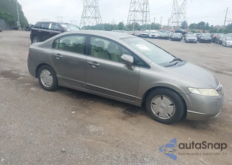 2006 Honda Civic Hybrid from USA, damaged, VIN JHMFA36216S014499